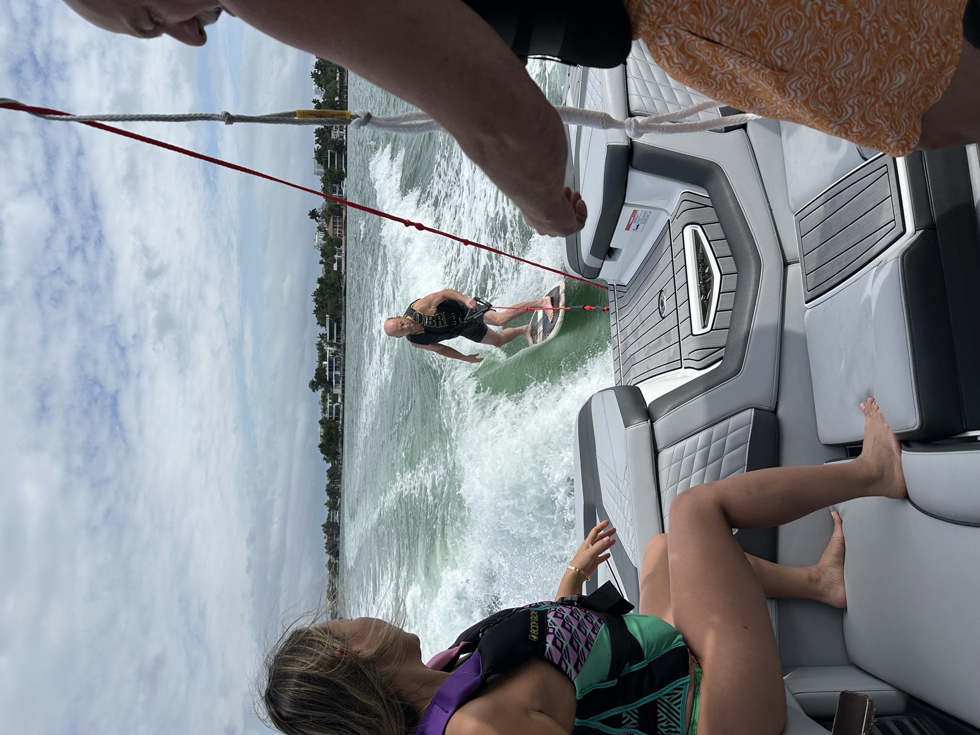 WakeXscape coach guiding a rider from the boat